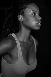 greyscale photo of woman wearing tank top thumbnail