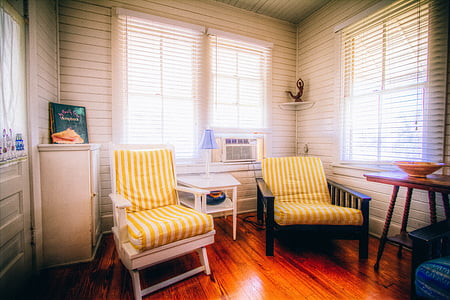 white wooden armchair beside table thumbnail
