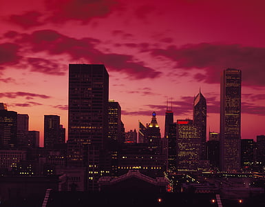 high-rise buildings at nighttime thumbnail