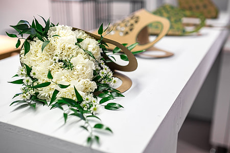 Beautiful bouquet of white flowers on a table thumbnail