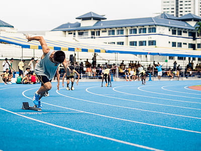 man running on track field thumbnail