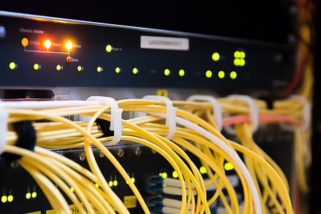 black electronic device with yellow cables thumbnail