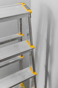 closeup photo of gray A-frame ladder thumbnail