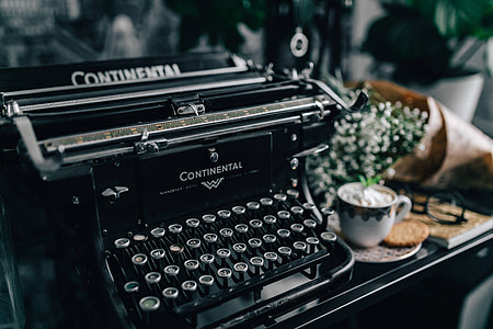 Black vintage typewriter thumbnail