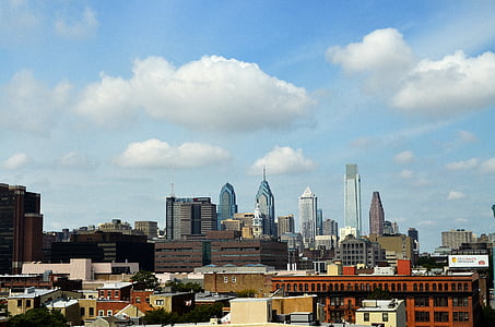 photograph of city structures during daytime thumbnail