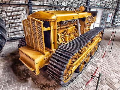 yellow tractor with continuous track thumbnail