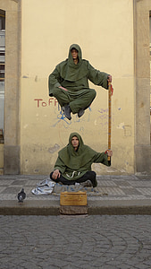 two men meditating in street thumbnail