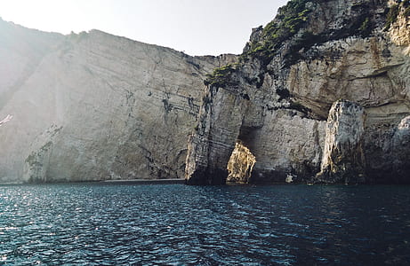 Body of Water Near in Rocks thumbnail