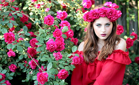 woman wearing red off-shoulder top and red rose headband during daytime thumbnail