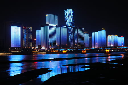 lighted building at night thumbnail