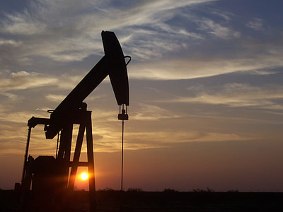 silhouette photo of heavy equipment during dawn thumbnail