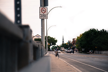 white bicycle signage on post thumbnail