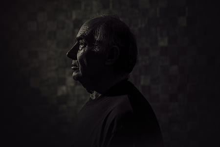 Side View of a Man in Black Top thumbnail