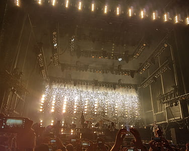 People Inside Building With Lights Watching Concert thumbnail