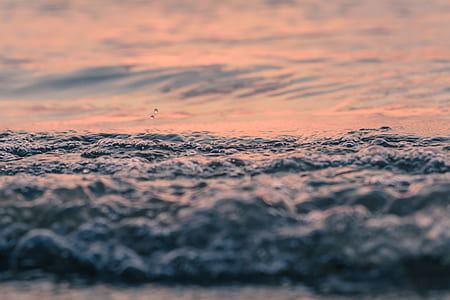 low angle photography of body of water thumbnail