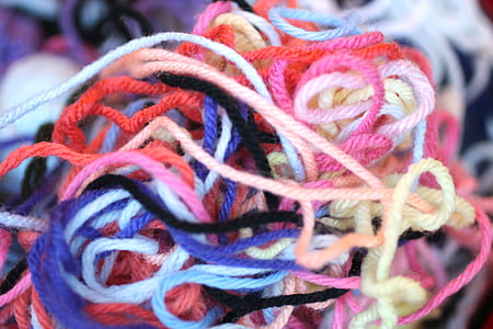 close-up photo of assorted-color yarns thumbnail
