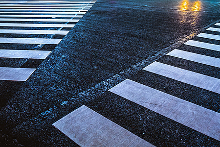 white and black Pedestrian Lane during rainy day thumbnail
