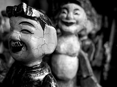 grayscale photography of man doll thumbnail