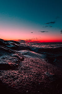waves crashing shore rocks thumbnail