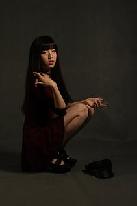 woman wearing red 3/4-sleeved dress thumbnail