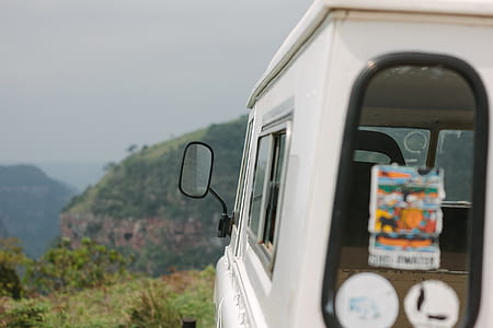vehicle parked on grass field thumbnail