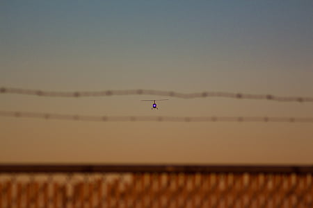black helicopter on sky thumbnail