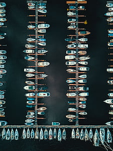 top-view photography of ships on dock thumbnail