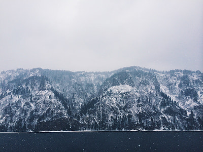 mountains covered with snow during daytime thumbnail
