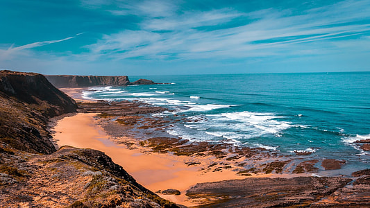 blue ocean under blue sky thumbnail