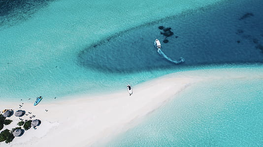 white boat in middle of sea thumbnail
