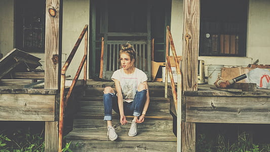Woman Sitting on the Wooden Stair thumbnail