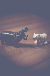 black rhino toy near white dog toy thumbnail