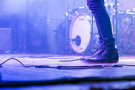 person standing on stage thumbnail