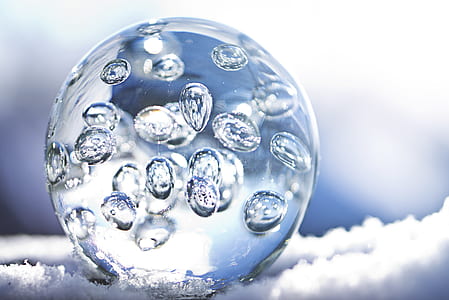 round clear glass on white surface at daytime thumbnail