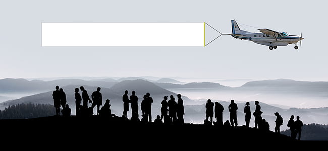 silhouette of poeple on mountain thumbnail