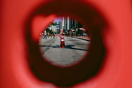 red and white traffic cones on road thumbnail