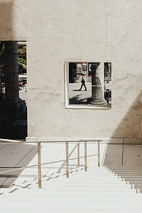 person walking near structure thumbnail