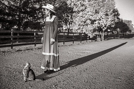 person wearing black and white dress thumbnail