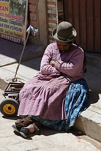 woman wearing pink and blue dress thumbnail