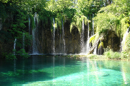 waterfalls during daytime thumbnail