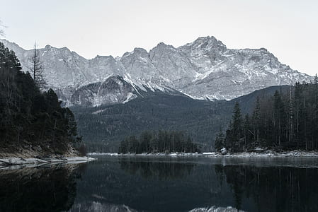 body of water near rocky mountain thumbnail