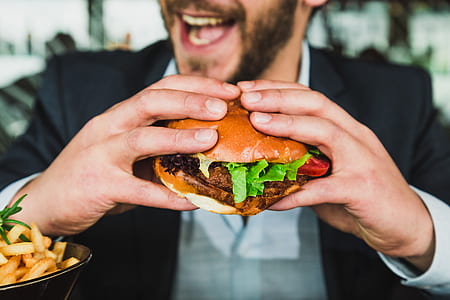 man eating hamburger thumbnail