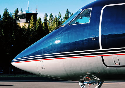closed up photo of blue airplane thumbnail
