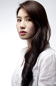 woman in white top wearing red lipstick thumbnail