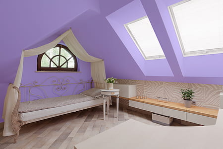 white mattress on bed near purple wall thumbnail