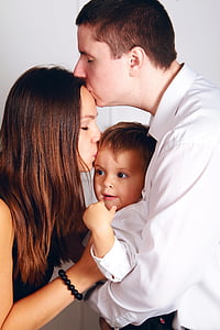 man kissing woman's forehead thumbnail