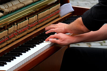 Person Playing Piano Photo thumbnail