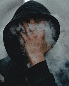 shallow photography of man smoking thumbnail
