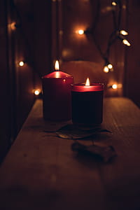tilt-shift photography of two candles thumbnail