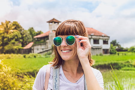 Woman Wearing Green Sunglasses thumbnail